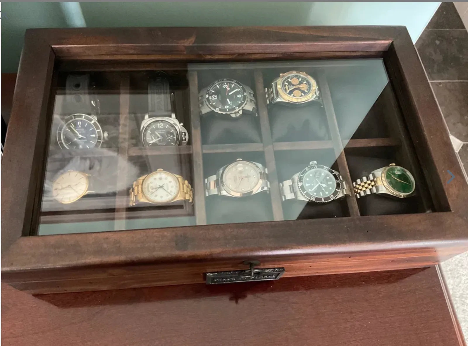 A customer’s Deferichs watch box filled with a varied collection of watches.
